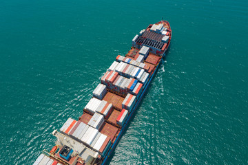 Fototapeta premium Aerial view of container cargo ship in sea