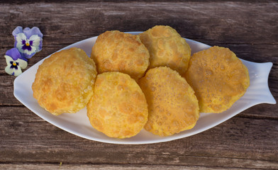 Plate of fried puri - indian traditional snack