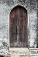 Old wooden door on historic buildings