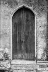 Old wooden door on historic buildings