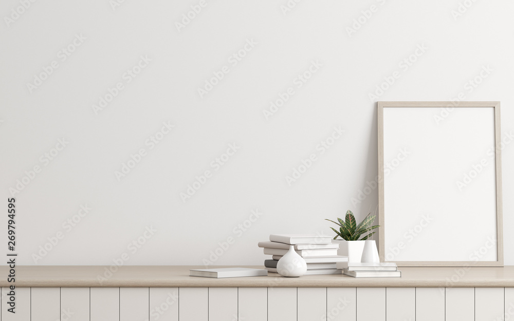 Poster mock-up of picture frame with small plant in vase and books on white wall. perspective of modern int