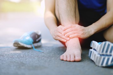 Young runners hurt the ankle Healthy love concept