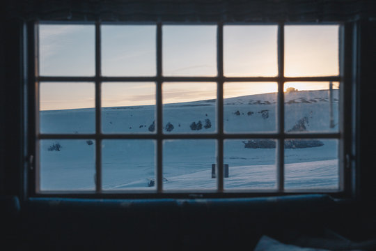 Winter landscape thru a cabin window on Svalbard. 