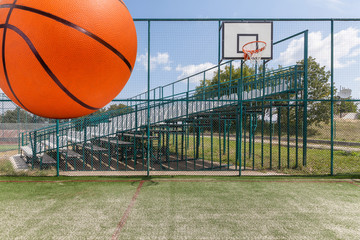 Sports playground for basketball and football by the mountains