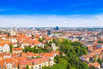 Fototapeta na wymiar Panoramic view on Upper town and Down town in Zagreb, red roofs and palaces of old baroque center of Croatia