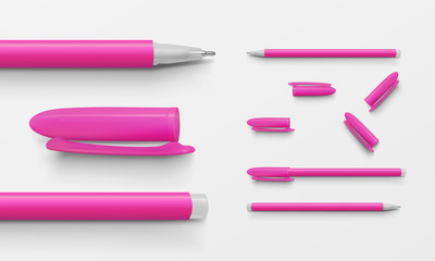 Set of pink colored office pens and caps