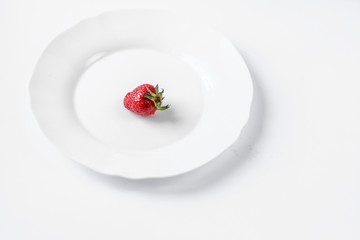 strawberries on a white plate