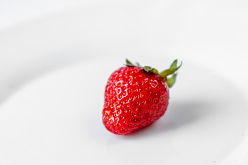 strawberries on a white plate