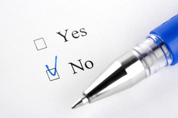 Yes. No. Filling in the questionnaire, documents. The checkboxes are filled with a black pen on a white background. Questionnaire, survey.