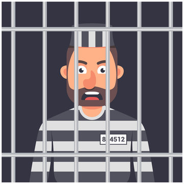 a man in prison. striped prisoner shape. man behind bars. 