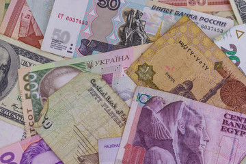 Multicurrency background of US dollars, Russian rubles, Belarusian rubles, Egyptian pounds and Ukrainian hryvnias