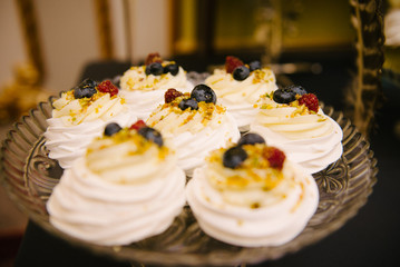 Sweet dessert table at a wedding.Cakestand at a wedding