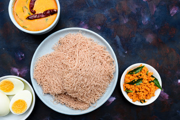 String hoppers, a famous breakfast food in Sri Lanka, India and Singapore. They are made up of rice or wheat flour.