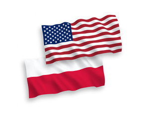 National vector fabric wave flags of Poland and America isolated on white background. 1 to 2 proportion.