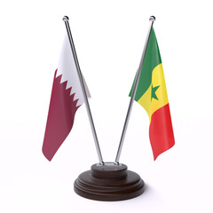 Qatar and Senegal, two table flags isolated on white background. 3d image