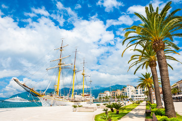 Beautiful sea promenade in Tivat, Montenegro. Kotor bay, Adriatic sea. Famous travel destination. - obrazy, fototapety, plakaty