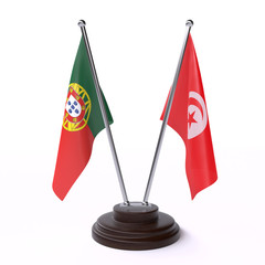 Portugal and Tunisia, two table flags isolated on white background. 3d image