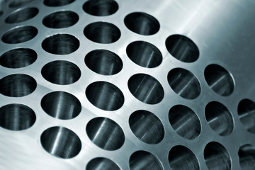 Metal surface with holes