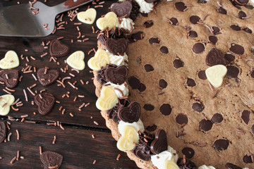Chocolate chip cookie cake on white background