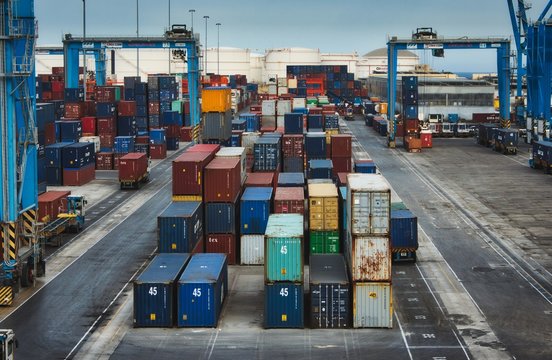 Cargo freight containers at a transhipment hub trade port