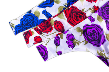 three pairs of thong panties in a flower roses