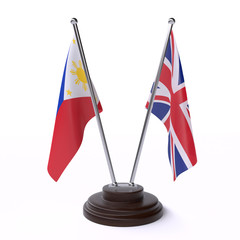 Philippines and UK, two table flags isolated on white background. 3d image