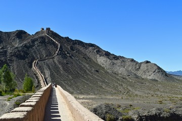 The ancient Great Wall from Ming Dynasty and the Gobi desert in Jiayuguan, Gansu province, China. 