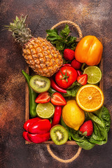 Fototapeta na wymiar Fruits and vegetables rich in vitamin C in box.