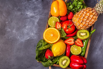 Fruits and vegetables rich in vitamin C in box.