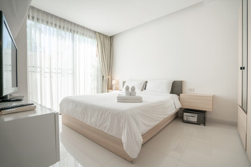 Fototapeta na wymiar interior design in bedroom with bright space