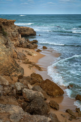 Headland at Robe, South Australia with crashing waves