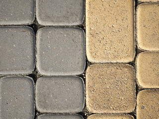 The texture of the stone and sidewalk