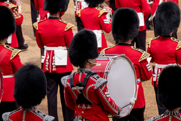 Trooping the Colour, military parade at Horse Guards, London UK, with musicians from the massed bands. The ceremony is reflected in the brass of the instruments.