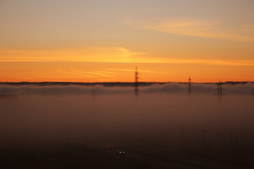 Fototapeta na wymiar Summer misty sunrise in the morning, masts