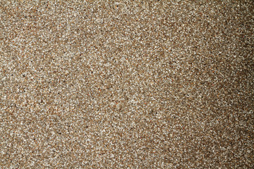 Sand and stone wall texture background.