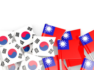 Pins with flags of South Korea and taiwan isolated on white.