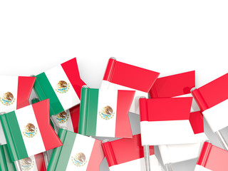 Pins with flags of Mexico and indonesia isolated on white.