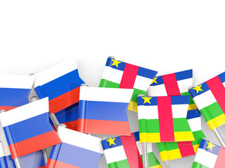 Pins with flags of Russia and central african republic isolated on white.