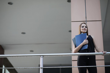 Girl with documents at a business meeting