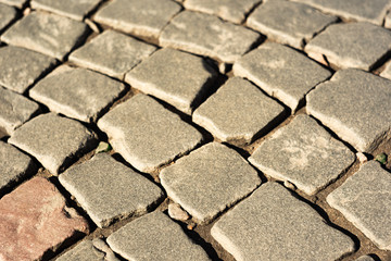A row of stones in the pavement