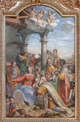 COMO, ITALY - MAY 8, 2015: The fresco of Adoration of Magi in church Basilica di San Fedele by unknown artist of 16. cent.