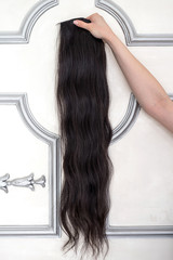 Naklejka premium Sample of dark brown hair extension