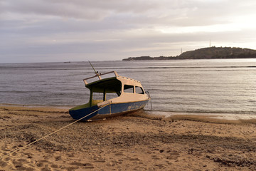 Boat on the white sandy beach in Gili Meno Island, Lombok, Indonesia