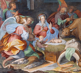 COMO, ITALY - MAY 8, 2015: The fresco of Nativity in church Basilica di San Fedele by unknown artist of 16. cent. © Renáta Sedmáková