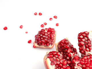 Red pomegranate fruit, isolated on a white background