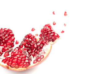 Red pomegranate fruit, isolated on a white background