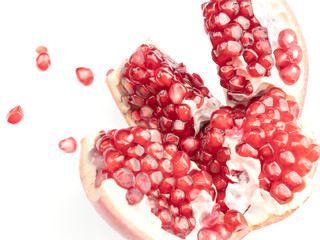 Red pomegranate fruit, isolated on a white background