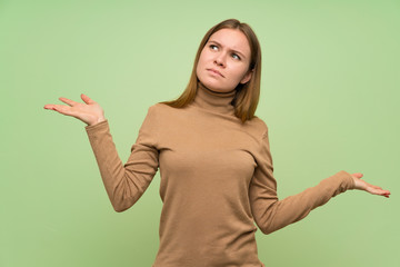 Young woman with turtleneck sweater unhappy for not understand something