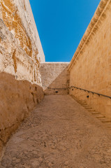 Narrow path and steps at Fort St. Angelo, Malta