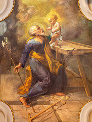 COMO, ITALY - MAY 9, 2015: The fresco of St. Joseph in church Chiesa di San Andrea Apostolo (Brunate) of by T. Conconi (1936).